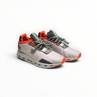 FWSports Shoes Cloudnova women's running sneakers in white, orange, and dark green with a sock-like mesh upper.