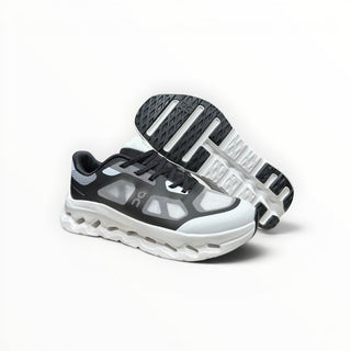 FWSports Shoes On Cloudtilt Remix black and white running sneakers with layered x-ray upper and CloudTec Phase sole.