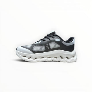 FWSports Shoes On Cloudtilt Remix men's running sneaker in black and white with a layered see-through x-ray upper.