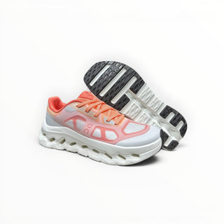 FWSports Shoes On Cloudtilt Remix women's running sneaker in coral, peach, and white with a layered x-ray mesh upper.