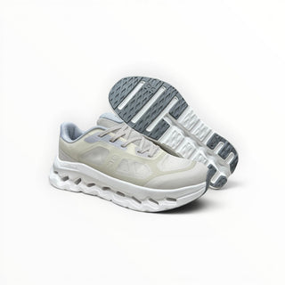 FWSports Shoes On Cloudtilt Remix women's running sneakers in cream, ice blue, and white with layered x-ray upper.