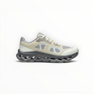 FWSports Shoes On Cloudtilt Remix women's running sneaker in cream, sand, and charcoal with layered x-ray mesh upper.