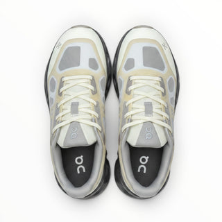 FWSports Shoes On Cloudtilt Remix men's running sneakers in cream, sand, and charcoal with layered x-ray mesh upper.