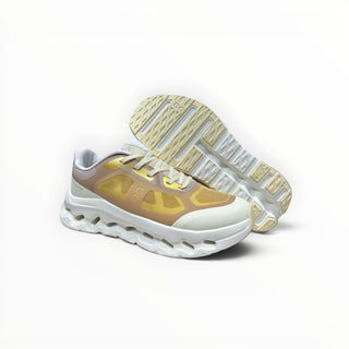 FWSports Shoes On Cloudtilt Remix running sneakers in honey, gold, and white with layered x-ray mesh and CloudTec sole