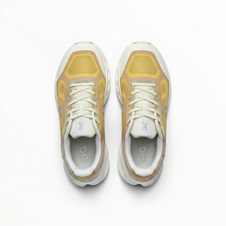 FWSports Shoes On Cloudtilt Remix running sneakers in honey, gold, and white with a layered x-ray mesh upper.