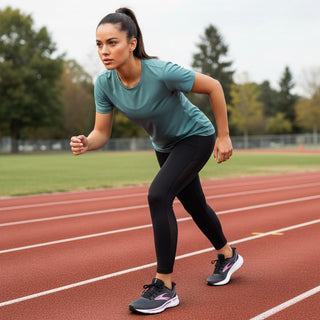 FWSports Shoes Glycerin Max 2 women's running shoes in black with plush cushioning on a track with a female runner.