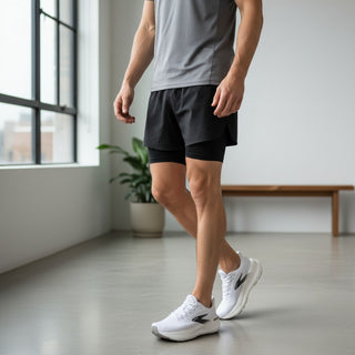 FWSports Shoes Glycerin Max 2 men's running shoes in white and black with plush cushioning and GlideRoll rocker sole.