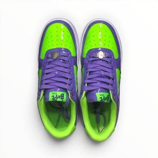 FWSports Shoes BAPE STA low-top sneakers in vibrant green and purple patent leather with lace-up closure.