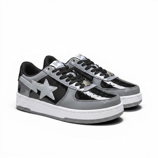 FWSports Shoes BAPE STA low-top sneakers in grey and black patent leather with signature star logo and lace-up closure.