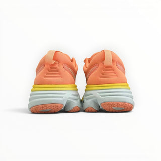 Rear view of FWSports Shoes Hoka Bondi 8 men's running shoes in orange with thick cushioned soles and heel pull tabs.