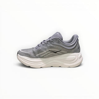 FWSports Shoes women's Hoka Bondi 9 running shoe in grey with a thick white cushioned midsole and mesh upper.