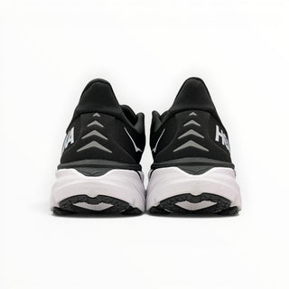 FWSports Shoes Hoka Clifton 8 women's running shoes in black and white, showing the flared heel and cushioned midsole.