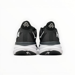 FWSports Shoes Hoka Clifton 9 women's running shoes in black and white, rear view showing reflective heel detail.