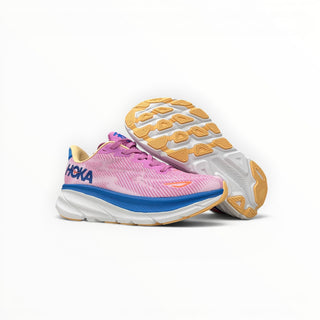 FWSports Shoes Hoka Clifton 9 women's running shoes in lilac with a thick white midsole and orange rubber outsole.