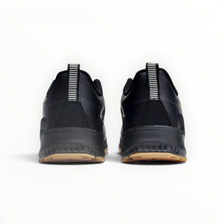 Rear view of FWSports Shoes KEEN NXIS EVO WP black waterproof hiking shoes with gum rubber outsoles and heel tabs.