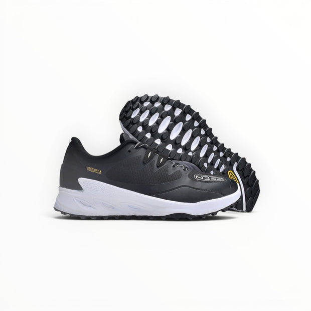 KEEN NXIS EVO WP women's waterproof hiking shoe in Black/White, three-quarter and outsole view