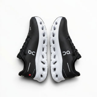 FWSports Shoes Mens On-Run Cloudtilt sneakers in black and white with breathable mesh and cushioned rocker sole