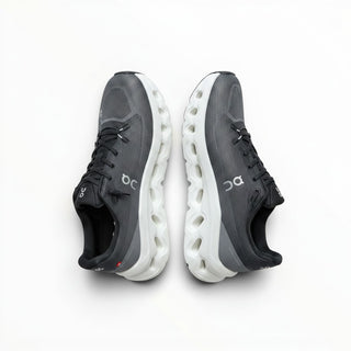 FWSports Shoes Mens On-Run Cloudtilt sneakers in black, gray, and white with mesh upper and rocker sole