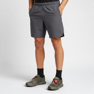 FWSports Shoes On Cloud 6 waterproof sneakers in olive green with black socks and grey athletic shorts