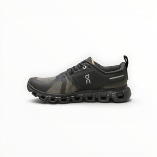 FWSports Shoes Womens On Cloud 6 waterproof running shoe in black and gray with a cushioned rubber lug outsole.