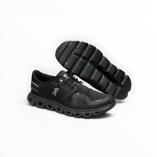 FWSports Shoes Womens On Cloud 6 Waterproof sneakers in pure black with mesh upper and lugged rubber outsole