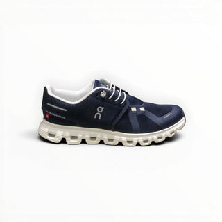 FWSports Shoes On Cloud 6 waterproof running shoe in navy blue and white with a cushioned sole and mesh upper.