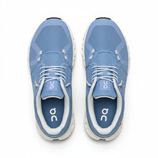 FWSports Shoes On Cloud 6 waterproof sneakers in light gray-blue and white with a breathable mesh upper and lace-up fit.