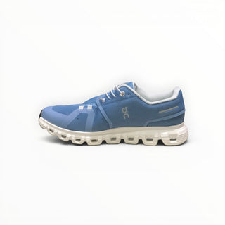 FWSports Shoes On Cloud 6 waterproof sneakers in light gray-blue and white with a cushioned sole and mesh upper.