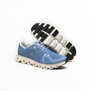 FWSports Shoes Womens On Cloud 6 Waterproof sneakers in light gray-blue and white with a durable lugged outsole