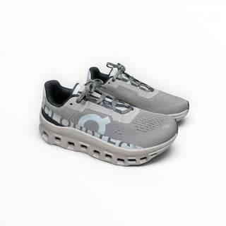 FWSports Shoes On Cloudmonster men's running shoes in Cinder Ash with breathable mesh upper and cushioned CloudTec sole.