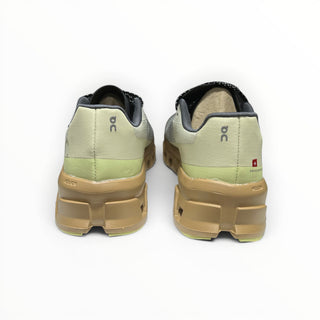 Rear view of FWSports Shoes On Cloudmonster running shoes in dune colour featuring oversized CloudTec soles.