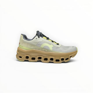 FWSports Shoes On Cloudmonster women's running shoe in dune with oversized CloudTec cushioning and mesh upper.