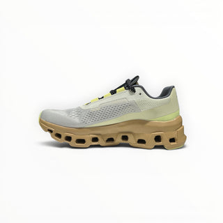 FWSports Shoes On Cloudmonster women's running shoe in dune beige with oversized CloudTec cushioning and mesh upper.