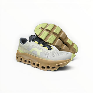 FWSports Shoes On Cloudmonster men's running shoes in dune beige with oversized CloudTec cushioning and mesh upper.