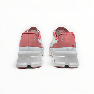 Rear view of FWSports Shoes On Cloudmonster women's running shoes in Gem Red with oversized white CloudTec cushioning.