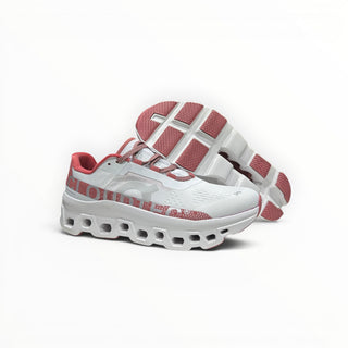 FWSports Shoes On Cloudmonster men's running shoes in gem red and white with oversized CloudTec cushioning.