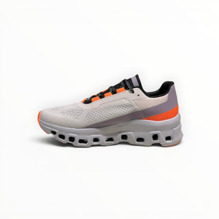 FWSports Shoes On Cloudmonster men's running shoes in gray and orange with breathable mesh and cushioned CloudTec sole.