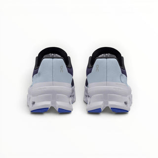 FWSports Shoes On Cloudmonster women's running shoes in lavender purple, showing the rear view of the cushioned soles.