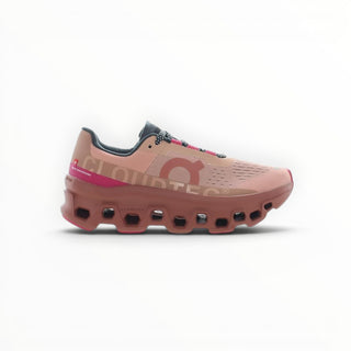 FWSports Shoes On Cloudmonster women's running shoe in rose pink with breathable mesh and thick CloudTec cushioning.