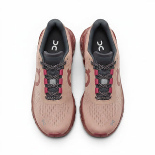 FWSports Shoes On Cloudmonster women's running shoes in rose pink with breathable mesh and cushioned CloudTec soles.