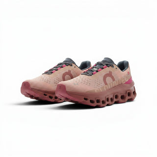 FWSports Shoes On Cloudmonster women's running shoes in rose pink with breathable mesh and thick CloudTec cushioning.