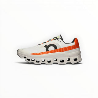 FWSports Shoes On Cloudmonster women's running shoes in white and orange with breathable mesh and CloudTec cushioning.
