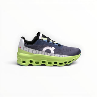 FWSports Shoes On Cloudmonster women's running shoe in iron black with a lime green oversized CloudTec midsole.