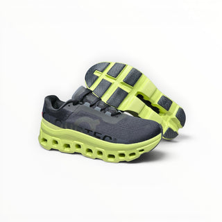 FWSports Shoes On Cloudmonster men's running shoes in black and acacia yellow with thick CloudTec cushioned soles.