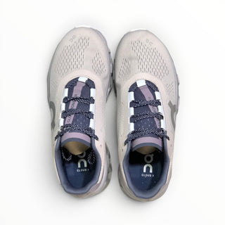 FWSports Shoes On Cloudmonster men's running shoes in gray, purple, and white with breathable mesh and CloudTec soles.