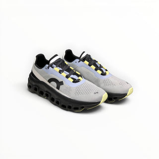 FWSports Shoes On Cloudmonster men's running shoes in fossilized lime and magnetic grey with breathable mesh upper.