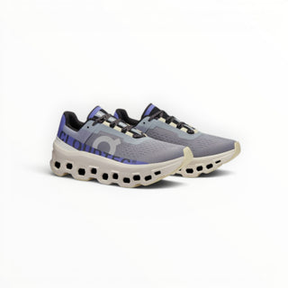 FWSports Shoes On Cloudmonster women's running shoes in mist blue and blueberry purple with thick CloudTec cushioning.