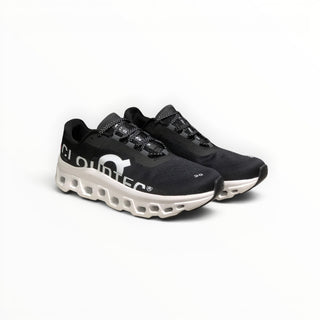 FWSports Shoes On Cloudmonster men's running shoes in black and white with breathable mesh and thick CloudTec sole.