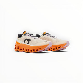 FWSports Shoes On Cloudmonster women's running shoes in yellowish white with orange CloudTec cushioning and mesh upper