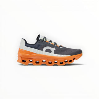 FWSports Shoes On Cloudmonster men's running shoes in turmeric and grey with thick CloudTec cushioning and mesh upper.